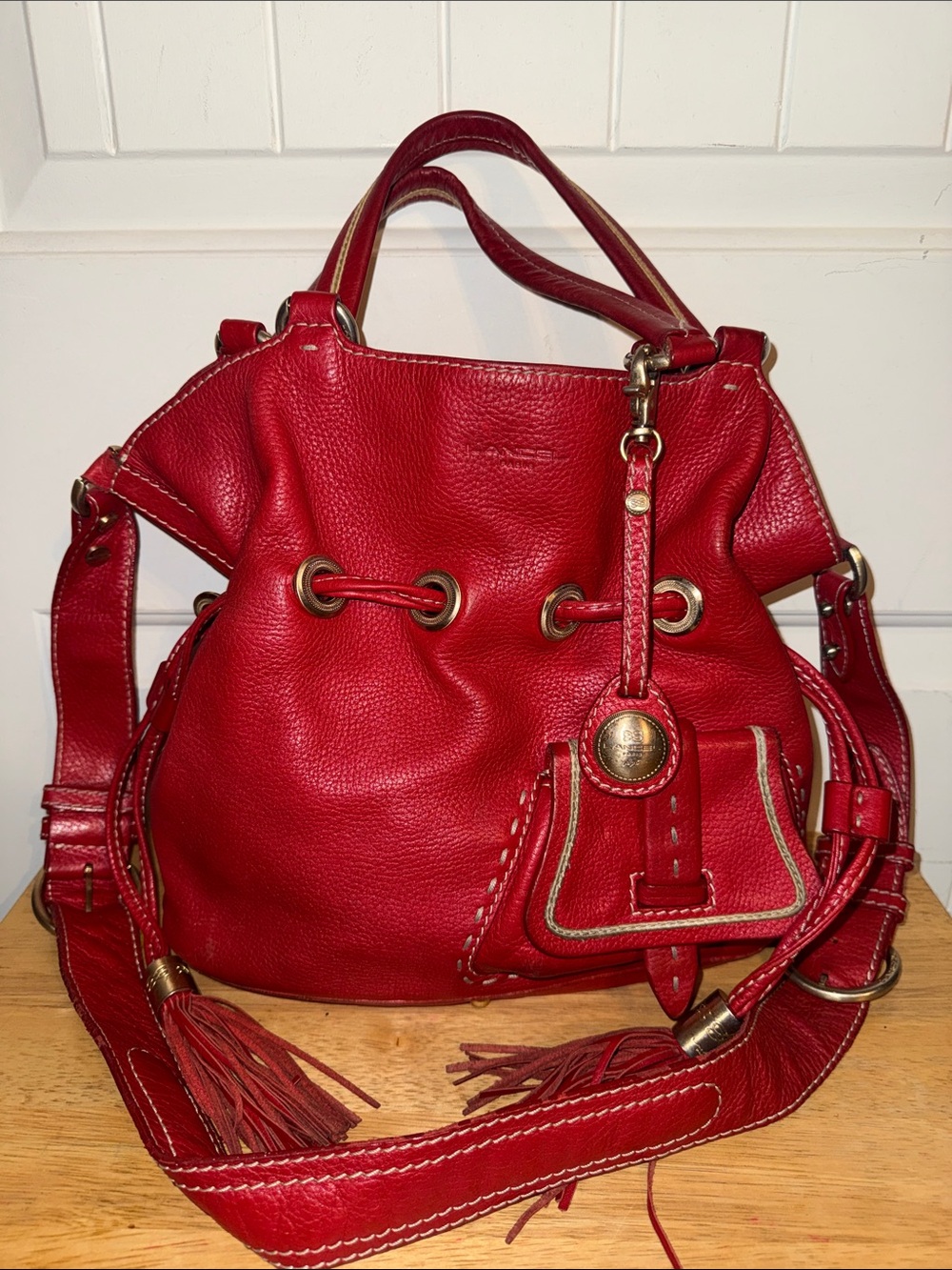 Women’s Lancel Paris Red Pebbled Leather Drawstring Shoulder Bag with Tassel